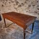 Antique French writing desk in oak with two drawers, 1920s.