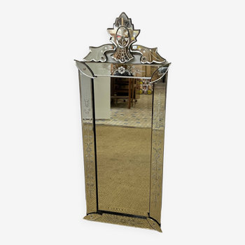 Venetian mirror with floral decoration pediment