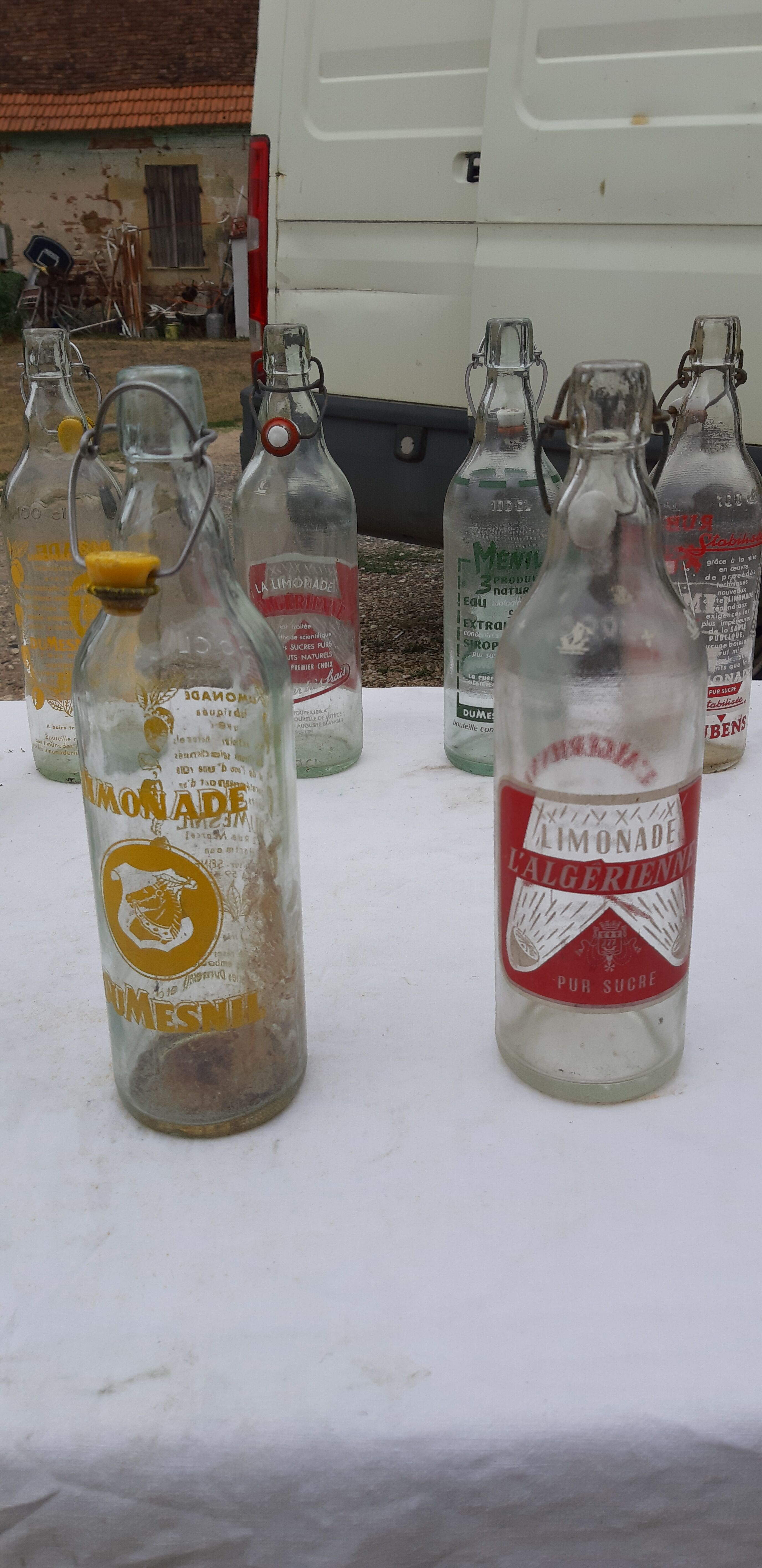 Lot de 20 bouteilles de limonades des années 50