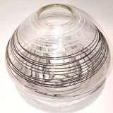 Textured oval blown glass vase with black and white glass spaghetti.