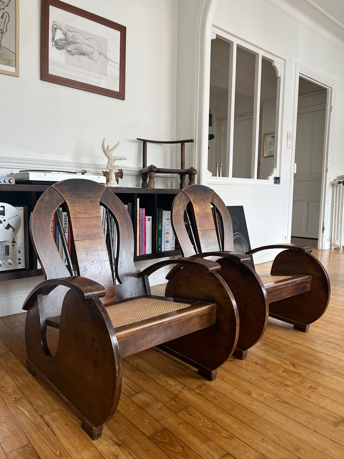 Pair of Art Deco armchairs in wood and cane.