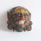 Two polychrome painted and gold leaf gilded Barong dance masks from Bali, Indonesia.