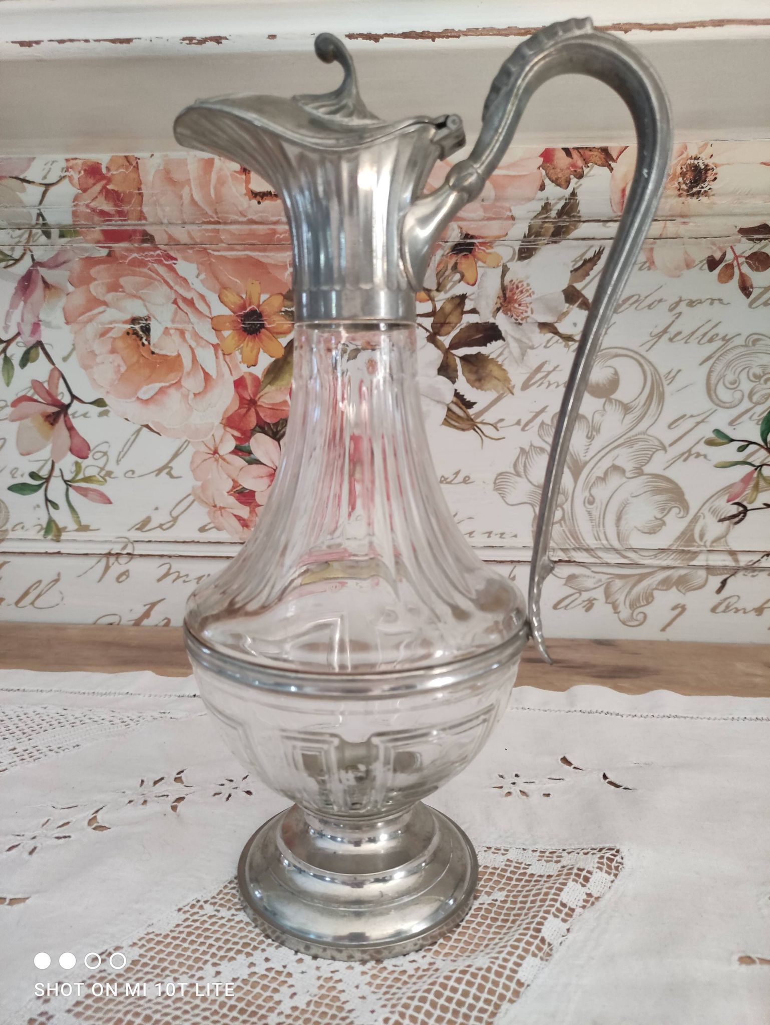 Old water decanter in curved glass and tin Art Nouveau style