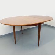 Round dining table in vintage Scandinavian style from the 50s and 60s in teak.