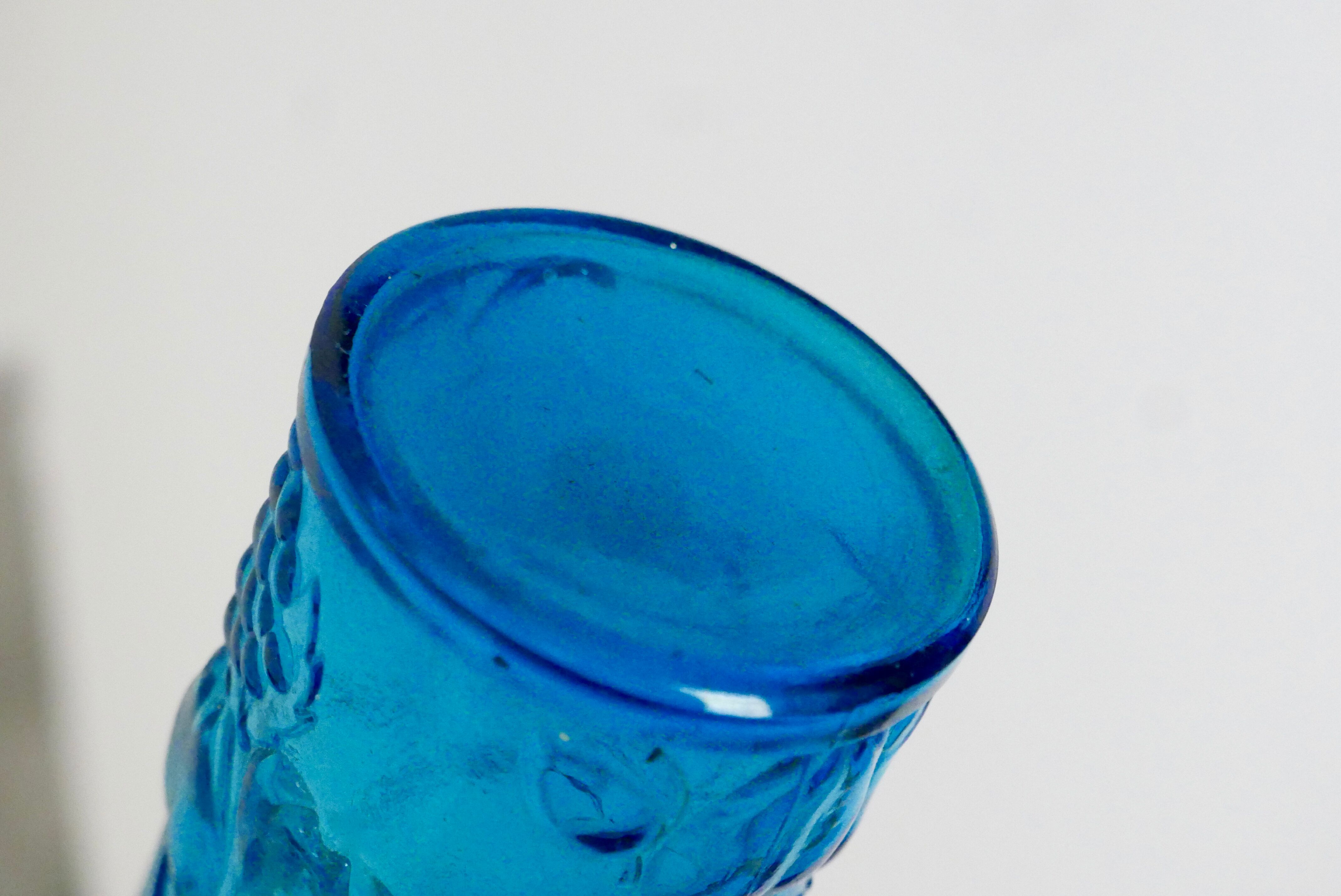 Italian bottle in blue glass, 60s