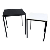 Pair of modernist nesting tables in black metal and white and black opaline 1960.