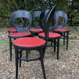 6 vintage Baumann seagull model chairs, black lacquered with red Skai seats.