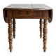 Antique solid wood drop-leaf dining table