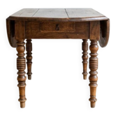 Table de salle à manger ancienne en bois massif à rabats