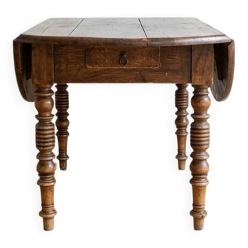 Table de salle à manger ancienne en bois massif à rabats