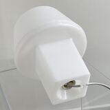 Minimalistic white plastic table lamp