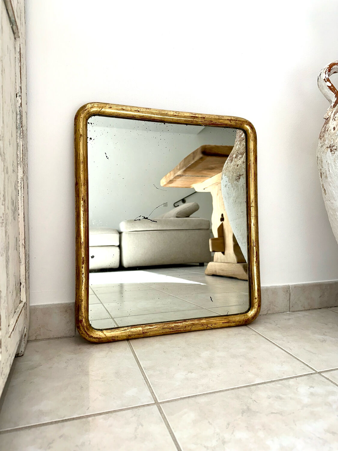 Antique gilded Louis-Philippe mirror, 19th century.