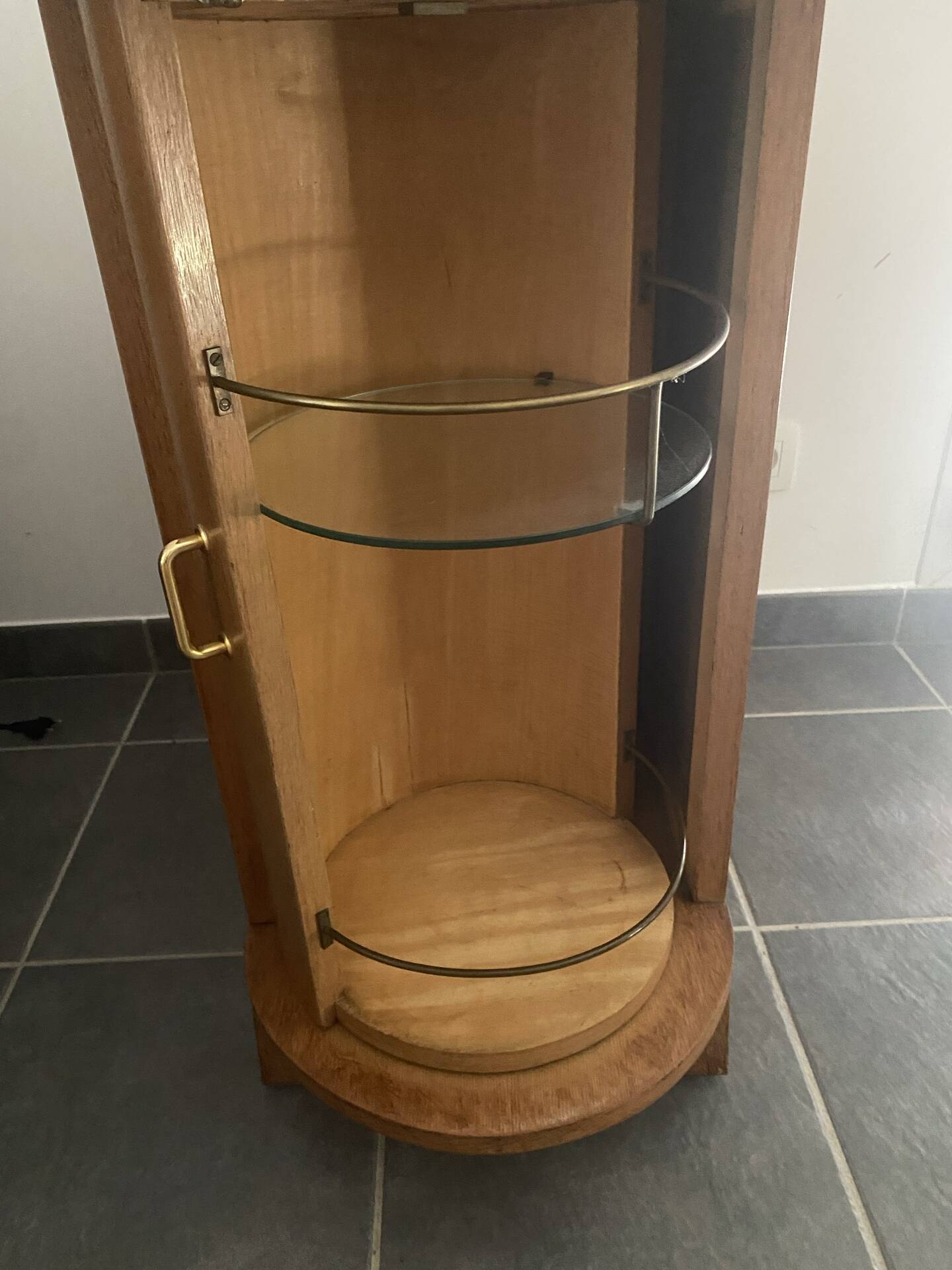 Rotating wooden bar cart from the 1950s.