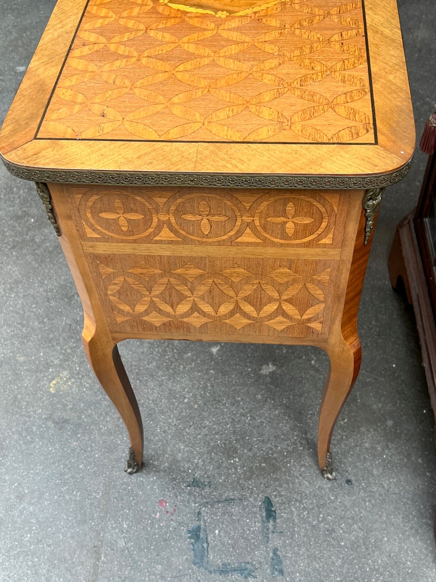 Louis XVI style chest of drawers with marquetry inlay