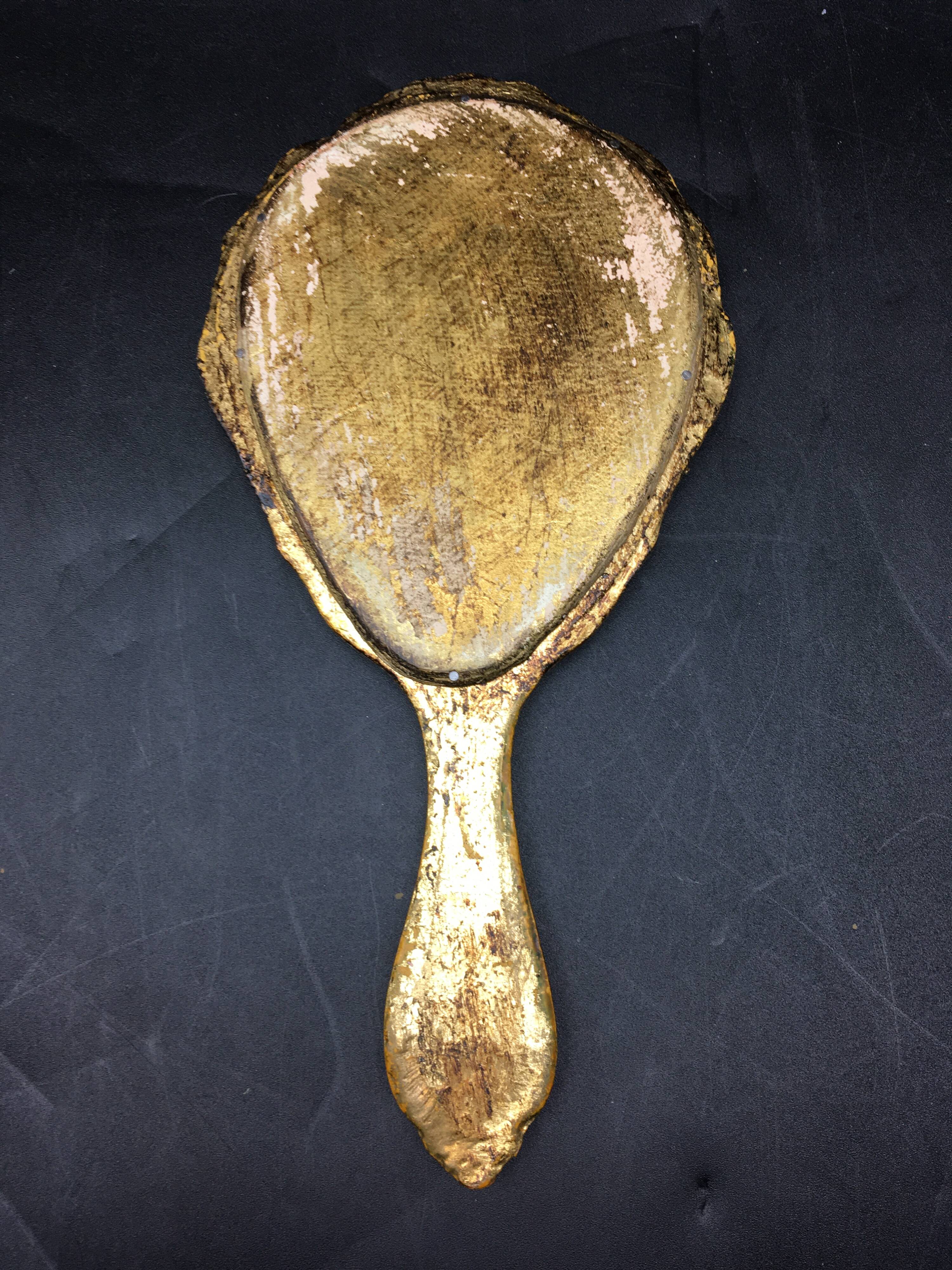 Venetian wooden hand-facing mirror