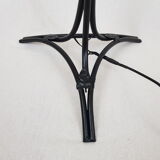 Golden brass tripod lamppost