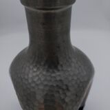 Vintage decanter in glass and tin.