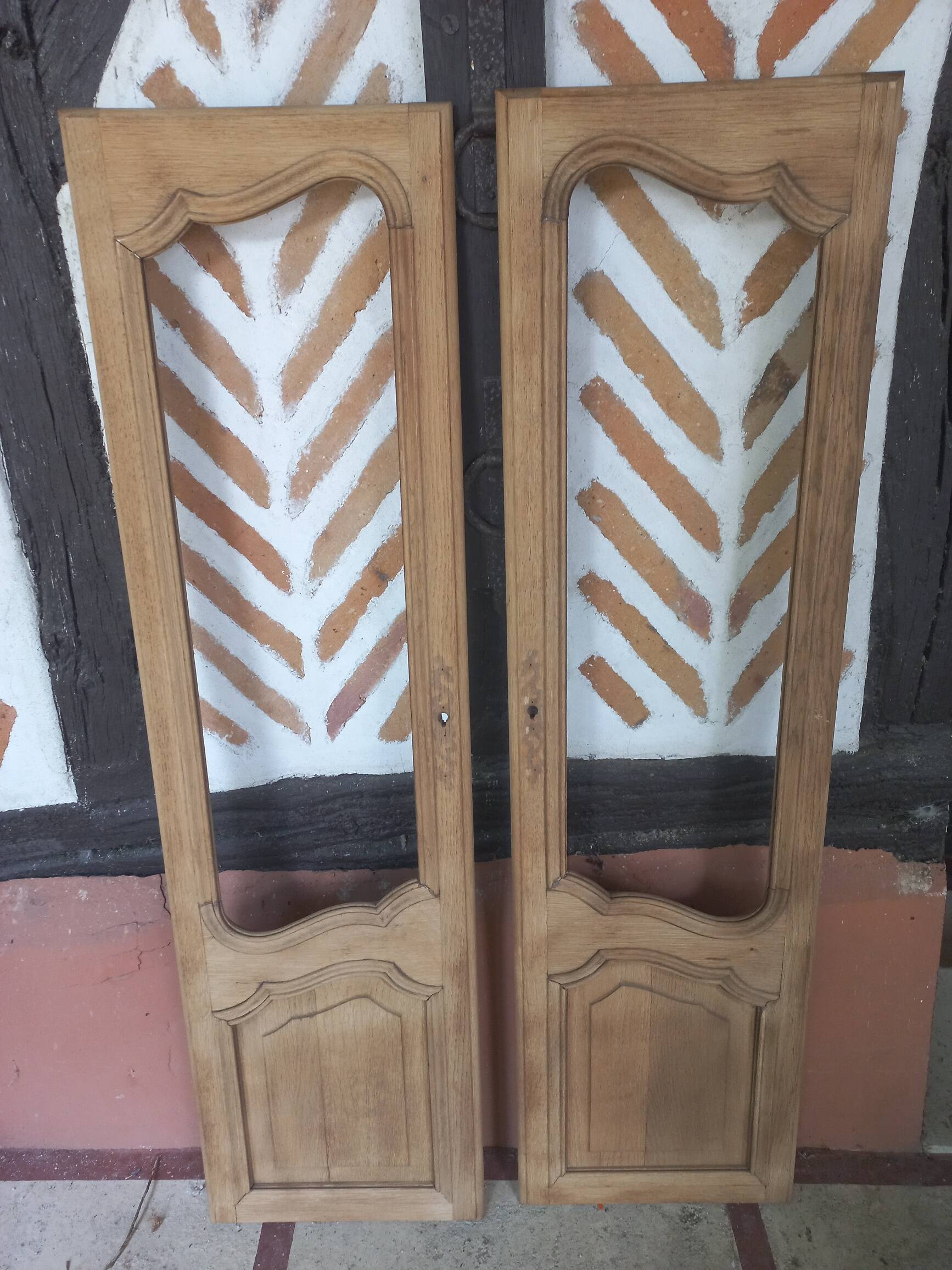 Pair of solid oak doors with a sanded finish.