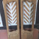 Pair of solid oak doors with a sanded finish.