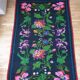 Handwoven summerish floral rug, black background with colorful delicate flowers 152x238cm