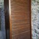French antique wardrobe with curtain in oak, circa 1920–1930.