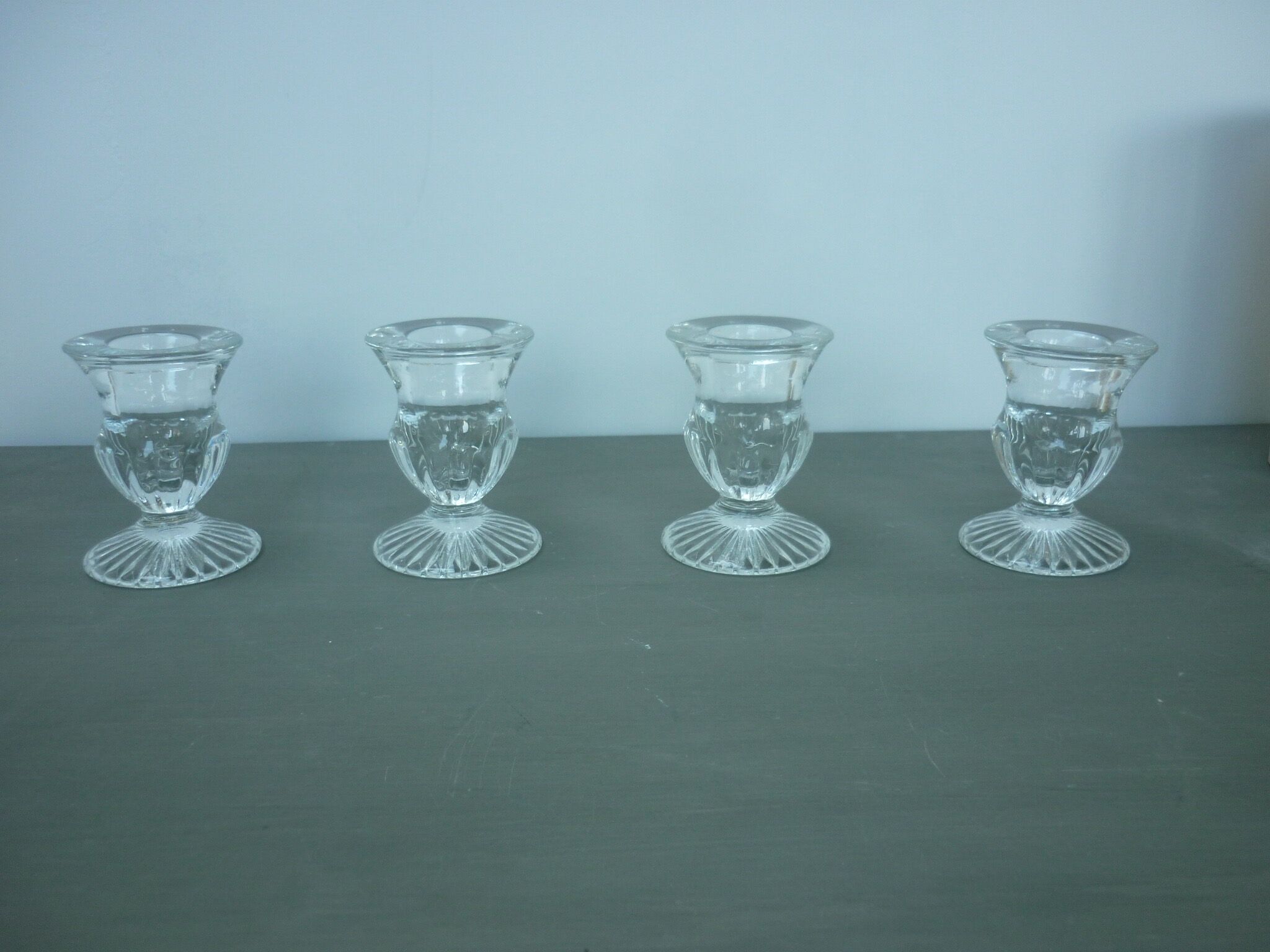 4 molded glass candle holders