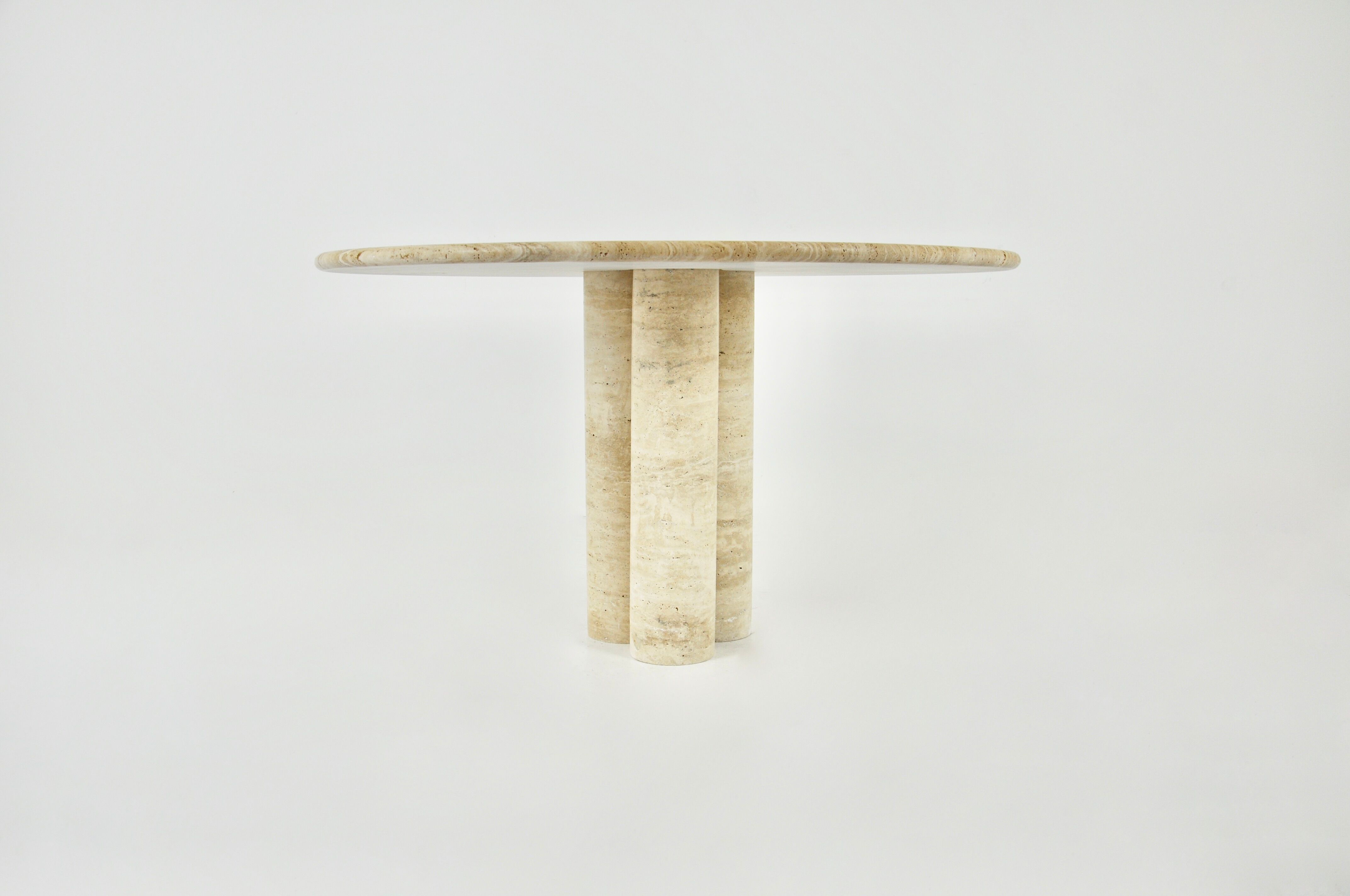 Circular travertine dining table