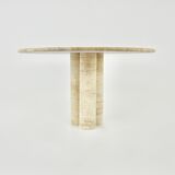 Circular travertine dining table