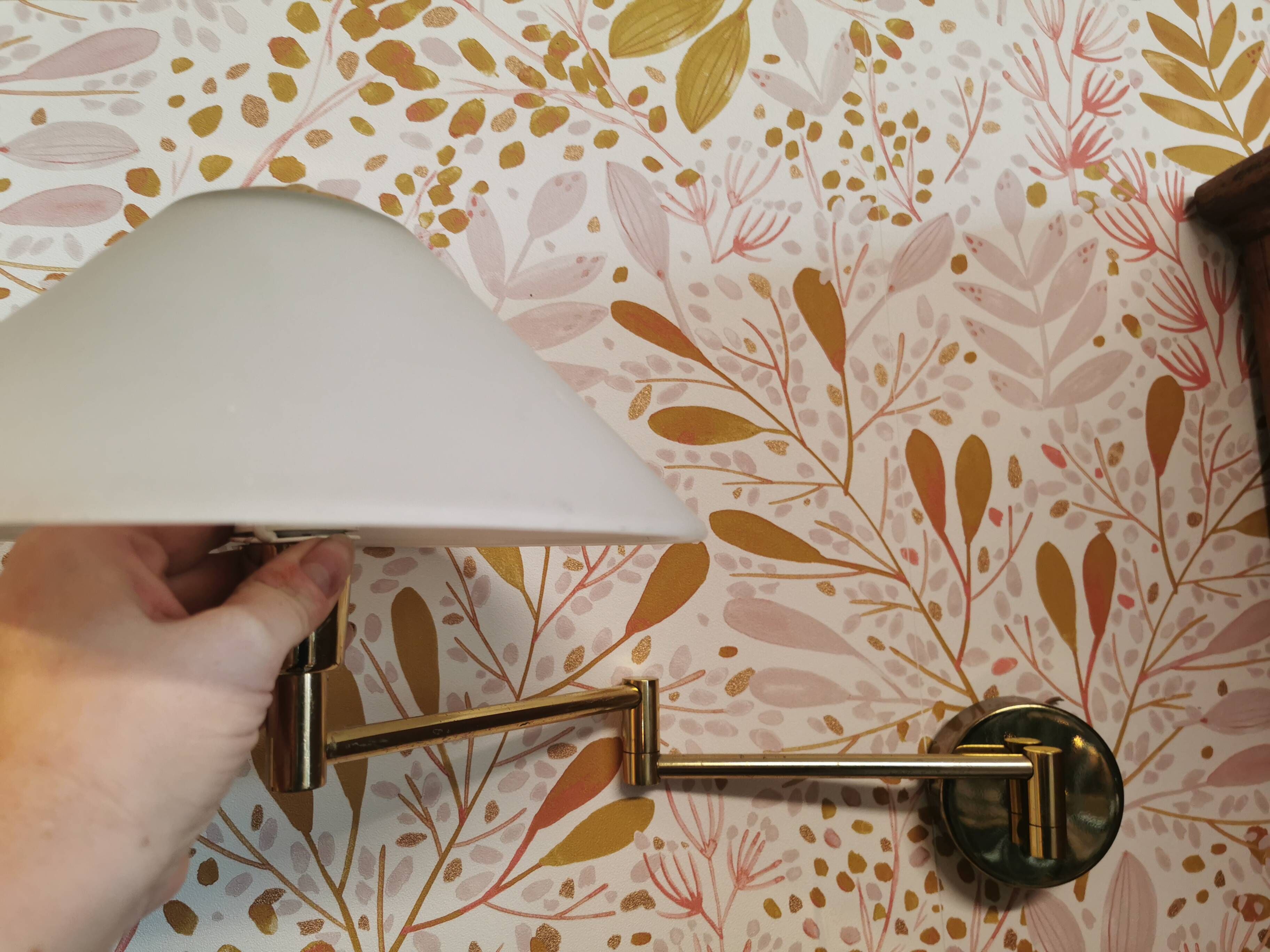 Brass wall lamp with vintage articulated arm, glass and brass shade