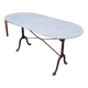 Restaurant bistro table in oval marble and decorated cast iron bases -1m51