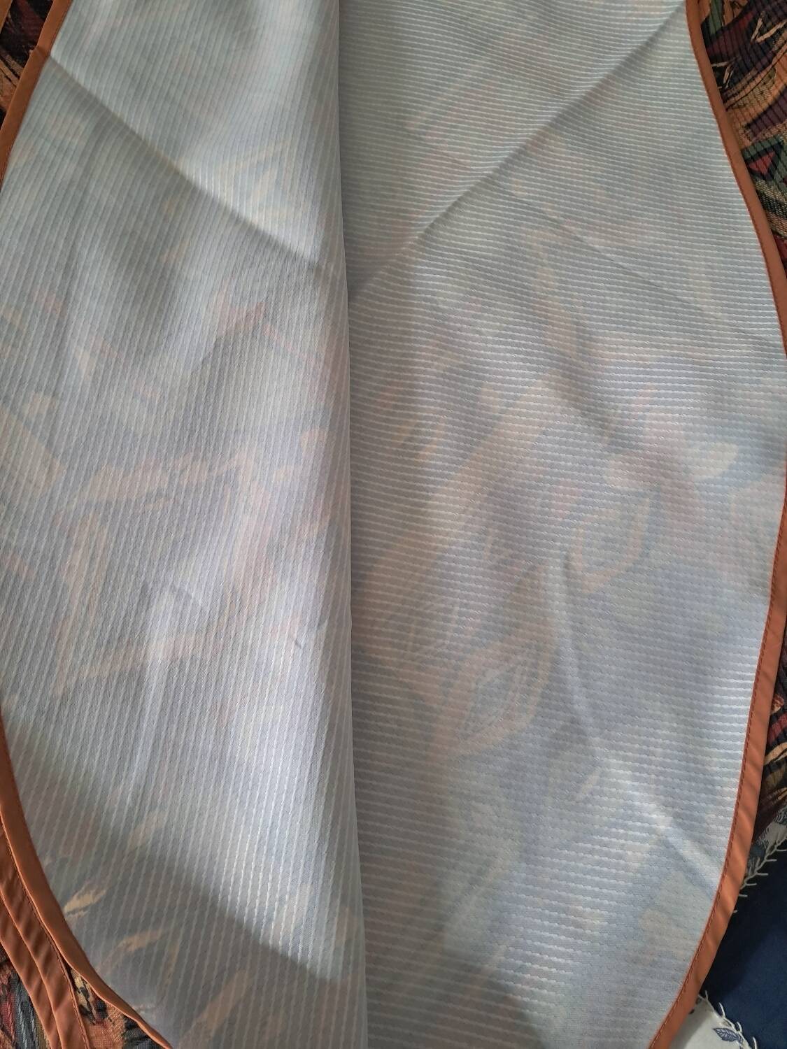 Oval tablecloth for 12 place settings