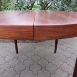 Round table with integrated extensions, rosewood. 1970