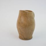 Small brown stoneware pitcher