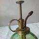 Spray for plants in brass and glass