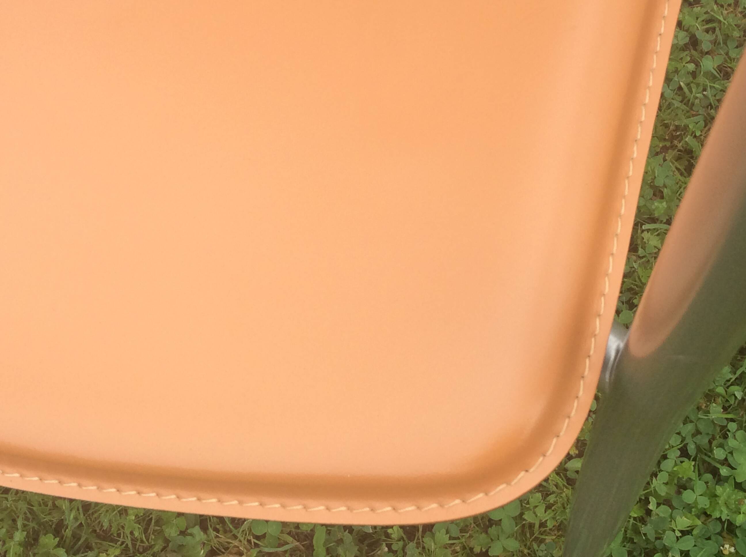 Leather and metal armchairs