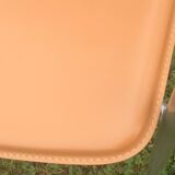 Leather and metal armchairs