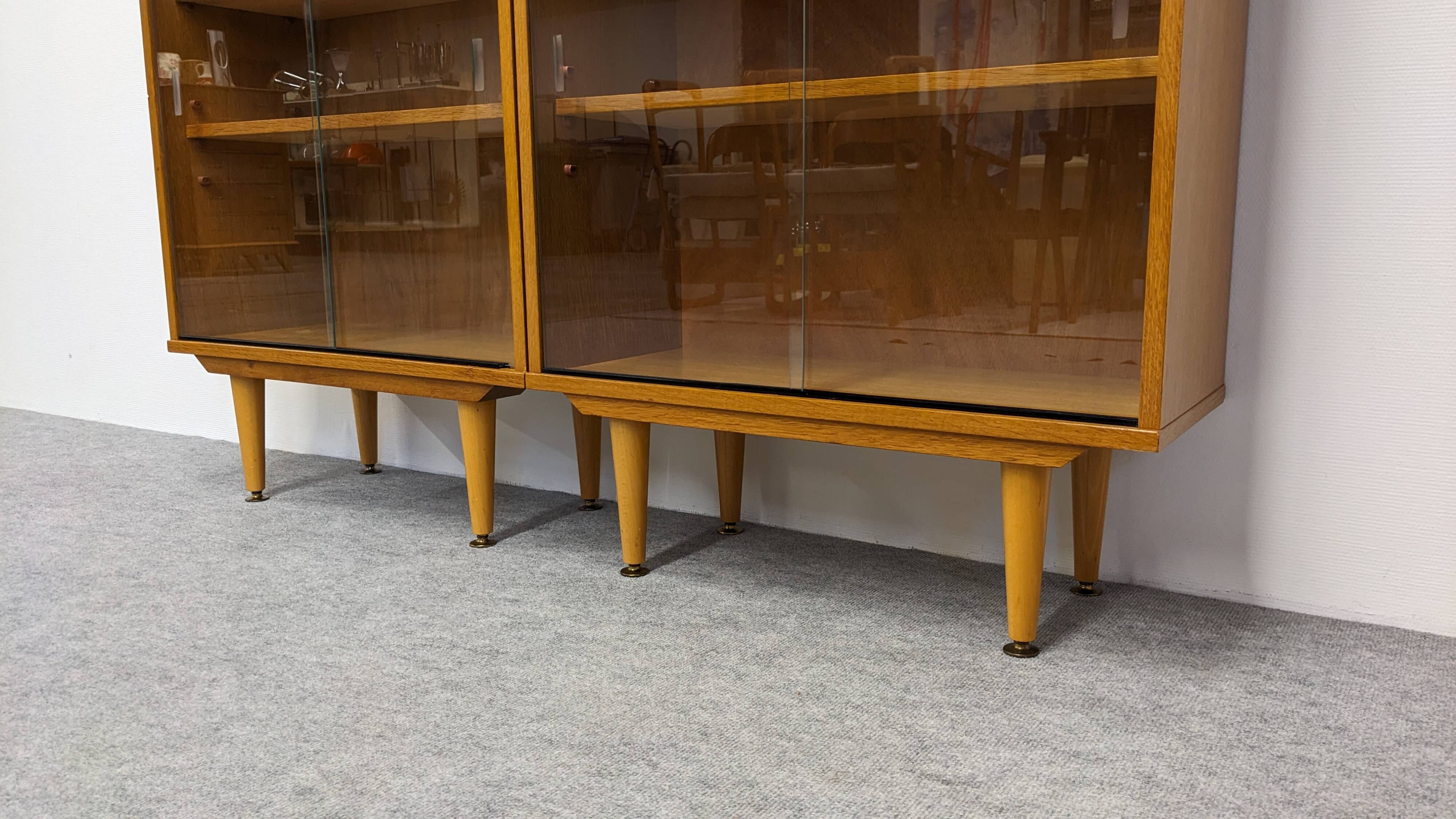 Library or display cabinet with 4 modules in light oak, France around 1960.
