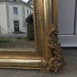 Mirror with a golden leaf pediment, 151x90cm