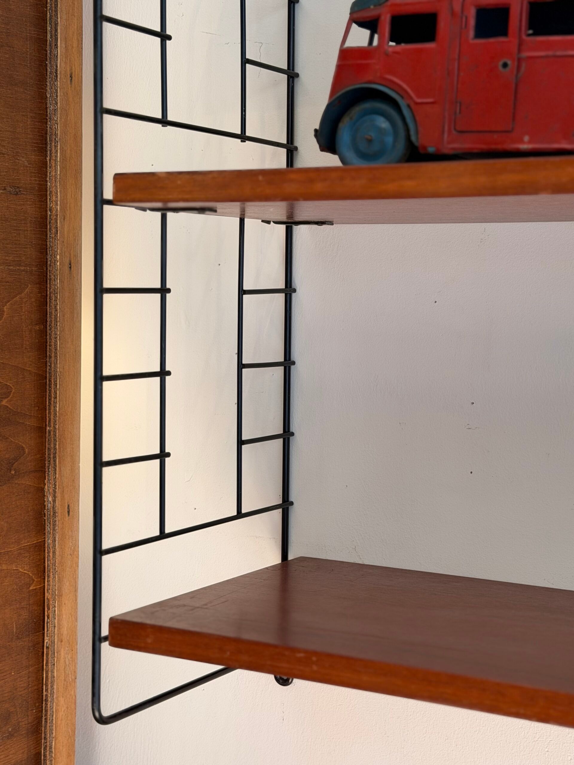 Modular wall shelf in teak – 1960s