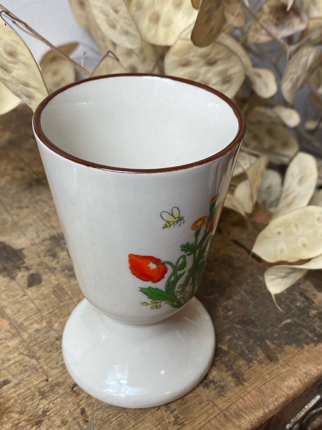 Pair of stoneware mazagrans, poppy decoration