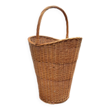 Old woven wicker umbrella stand