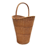 Old woven wicker umbrella stand
