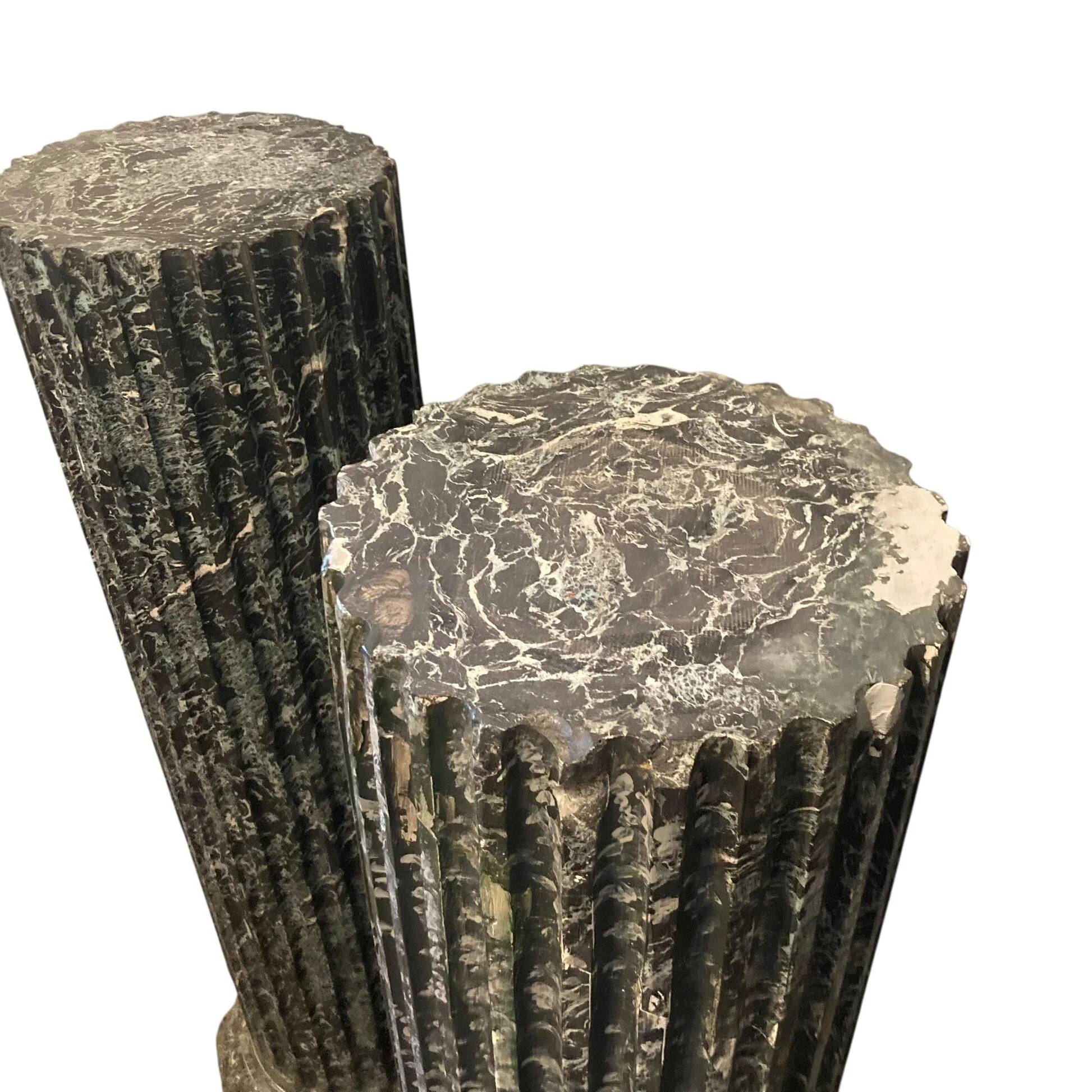 Pair of black and green scagliola columns from the 19th century.