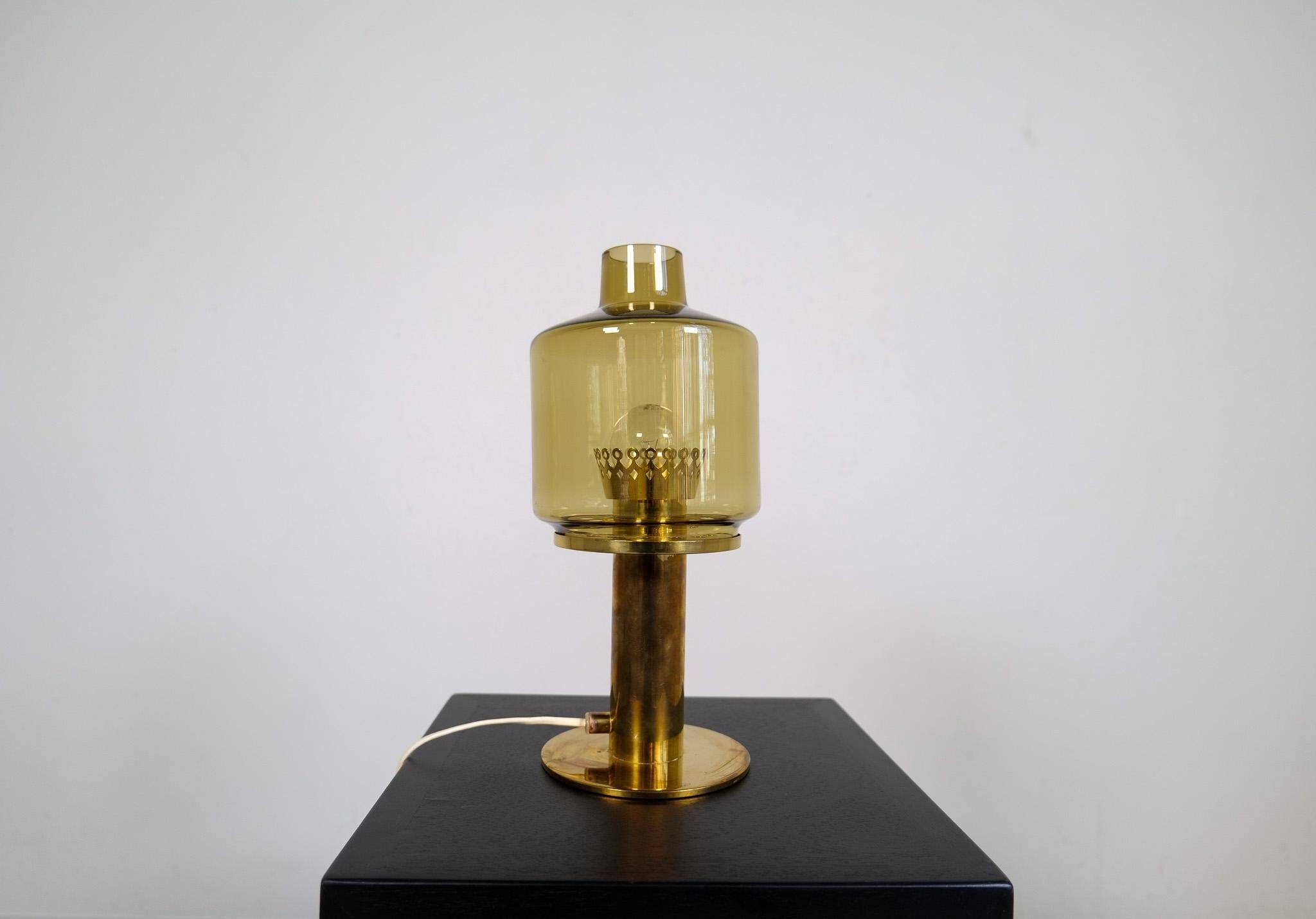 Hans-Agne Jakobsson Table Lamp Model B-102 in brass and glass, 1960s, Sweden