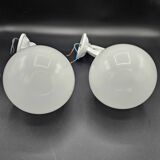Pair of white enameled cast iron wall sconces, mid-20th century