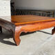 Teak coffee table in opium style.