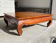 Teak coffee table in opium style.