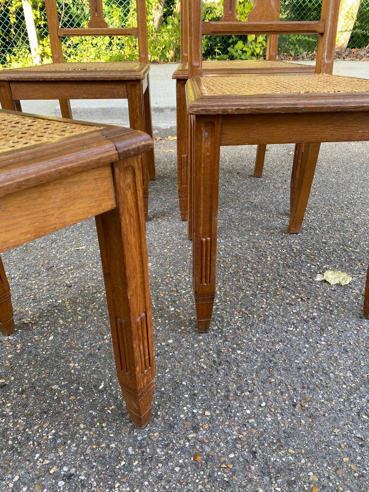 4 Art Deco chairs, solid oak, caned, 1950s.