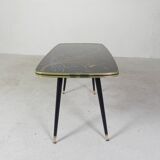 Vintage coffee table with glass top and angled legs, 1950s