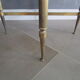 Marble pedestal table and brass hollywood regency
